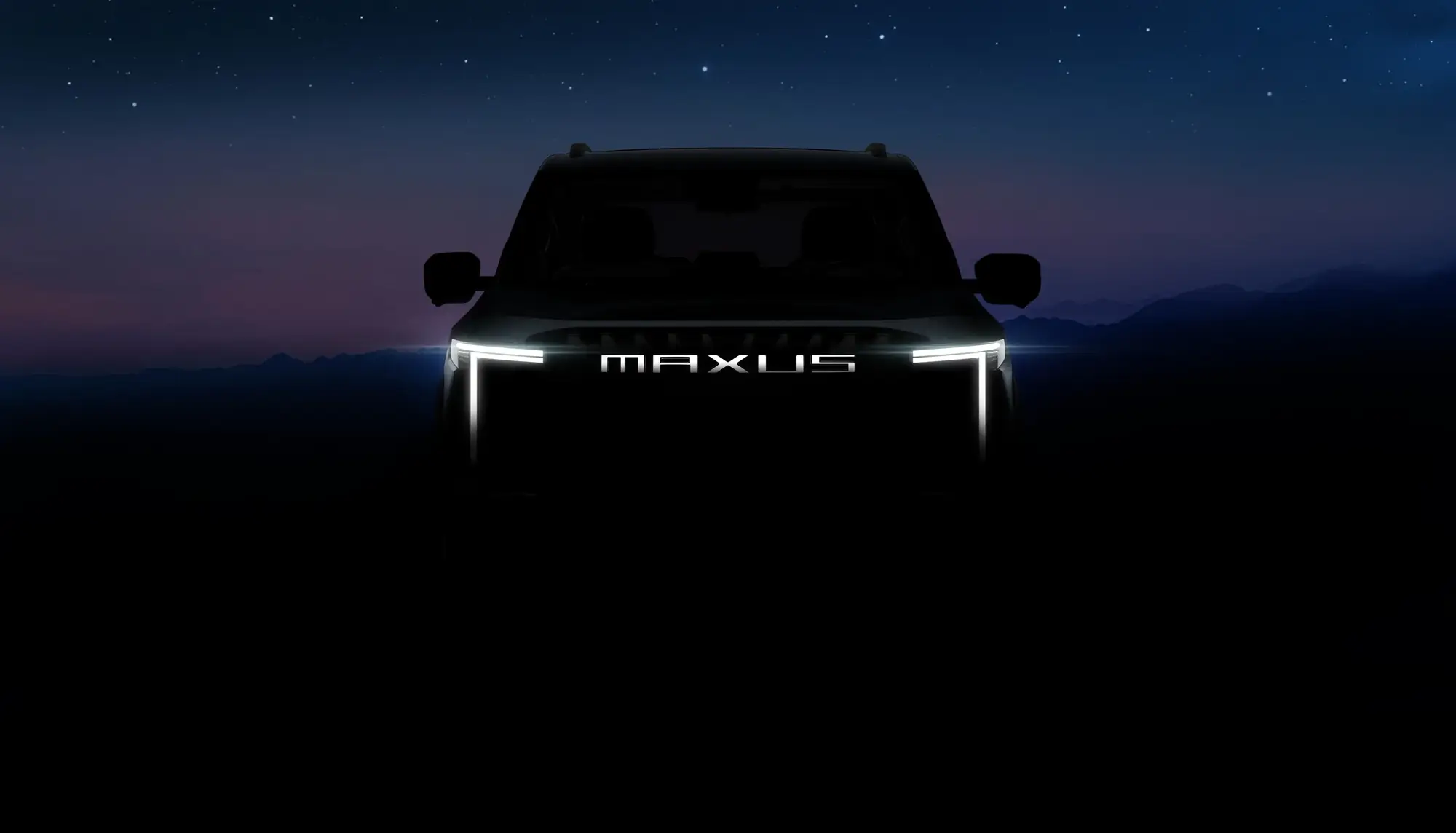MAXUS TERRON 9 at dusk, grille lights on